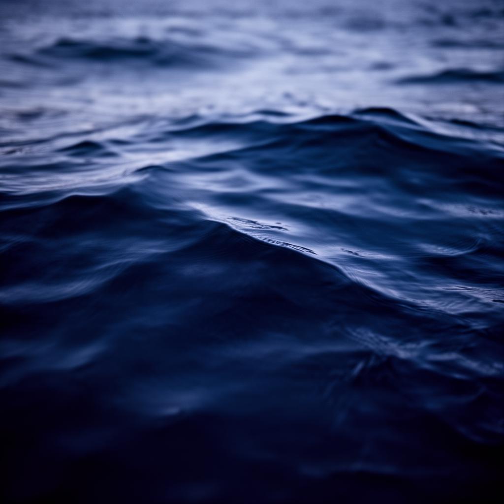 Abstract mazarine-blue water surface